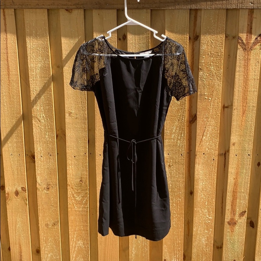 Sexy black dress with lacy sleeves